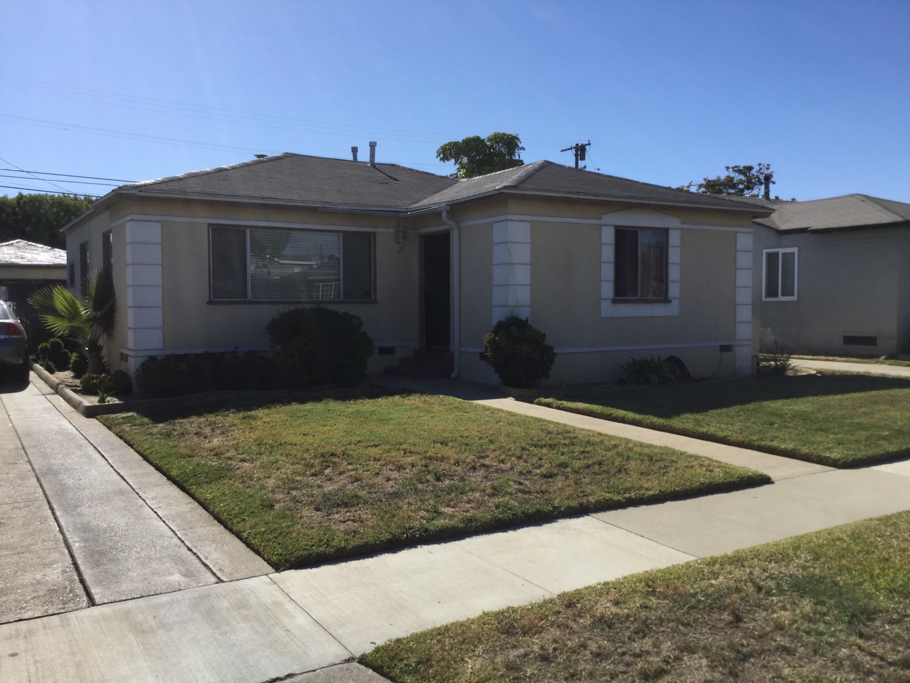 Exterior repaint, trim and fascia rebuild in Lakewood — before