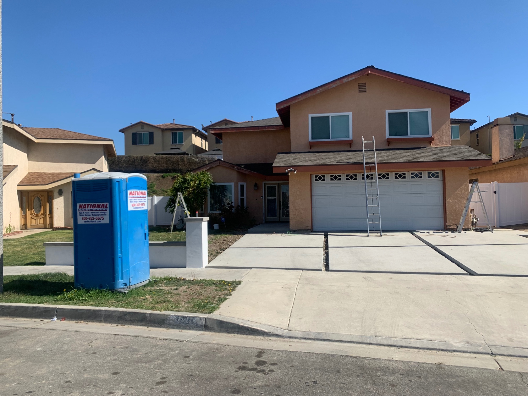 Two-story remodel, siding, driveway & repaint in Long Beach — before