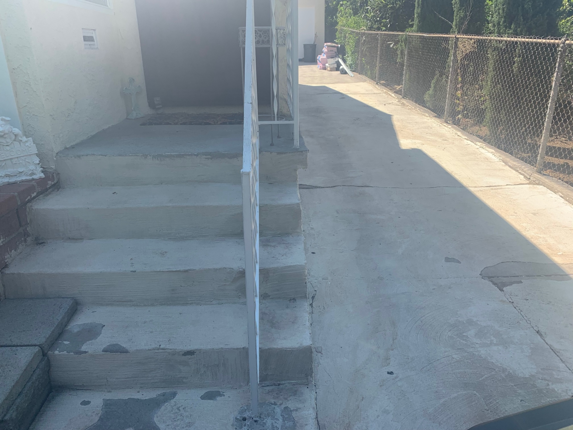 Paver driveway, entry steps & block retaining wall in Lomita — before